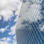 Building, reflection, clouds — An Overview of Leading Online Weed Dispensaries in Canada