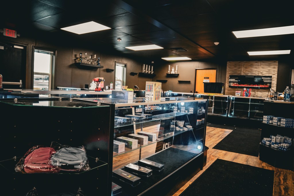 Interior view of a cannabis dispensary with product displays.