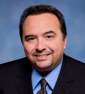 Dr. V. Greg Gonzaba